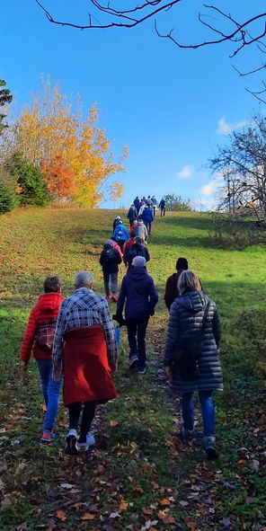 Group of people walking up a beautiful hill in Nova Scotia Dartmouth Volksmarch Club
